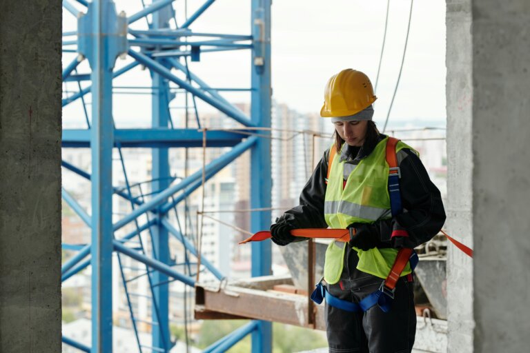Construction worker on a New York City job site wearing safety gear
